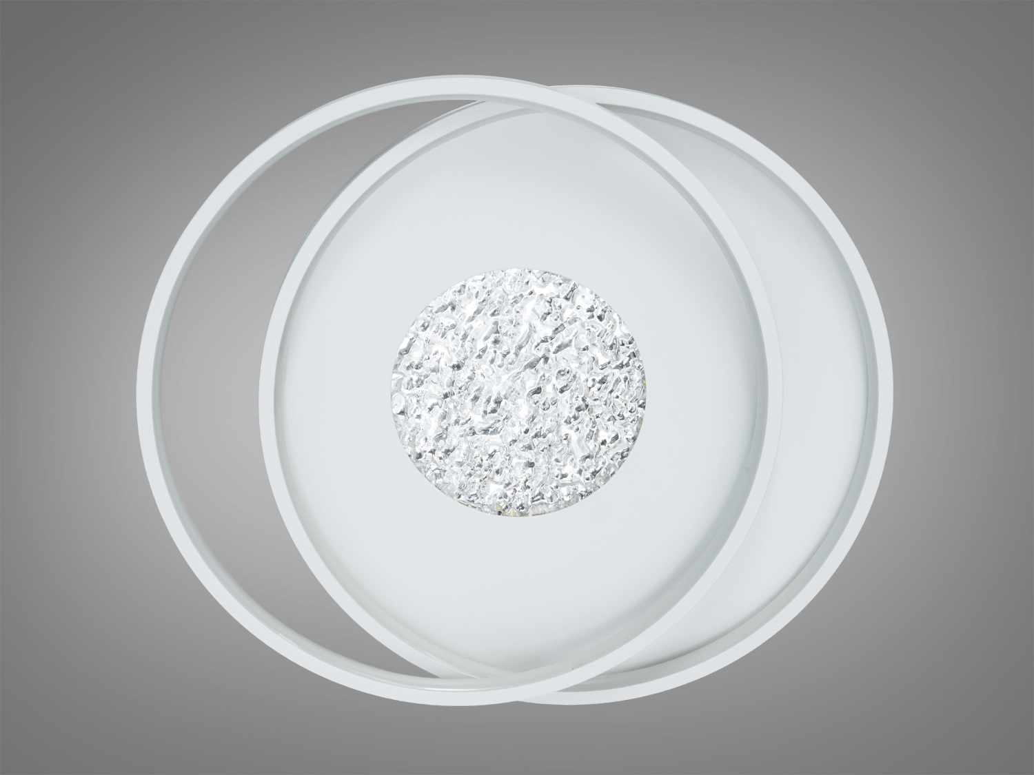 Стельовий світильник без увімкненого світла, з двома пересічними кільцями та текстурованим центром. Сучасний дизайн для будь-якого інтер′єру.