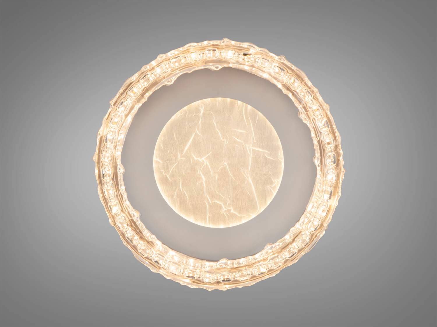 Стельова люстра з теплим світлом, кругла форма з рельєфним обідком. Ідеальна для затишної атмосфери.