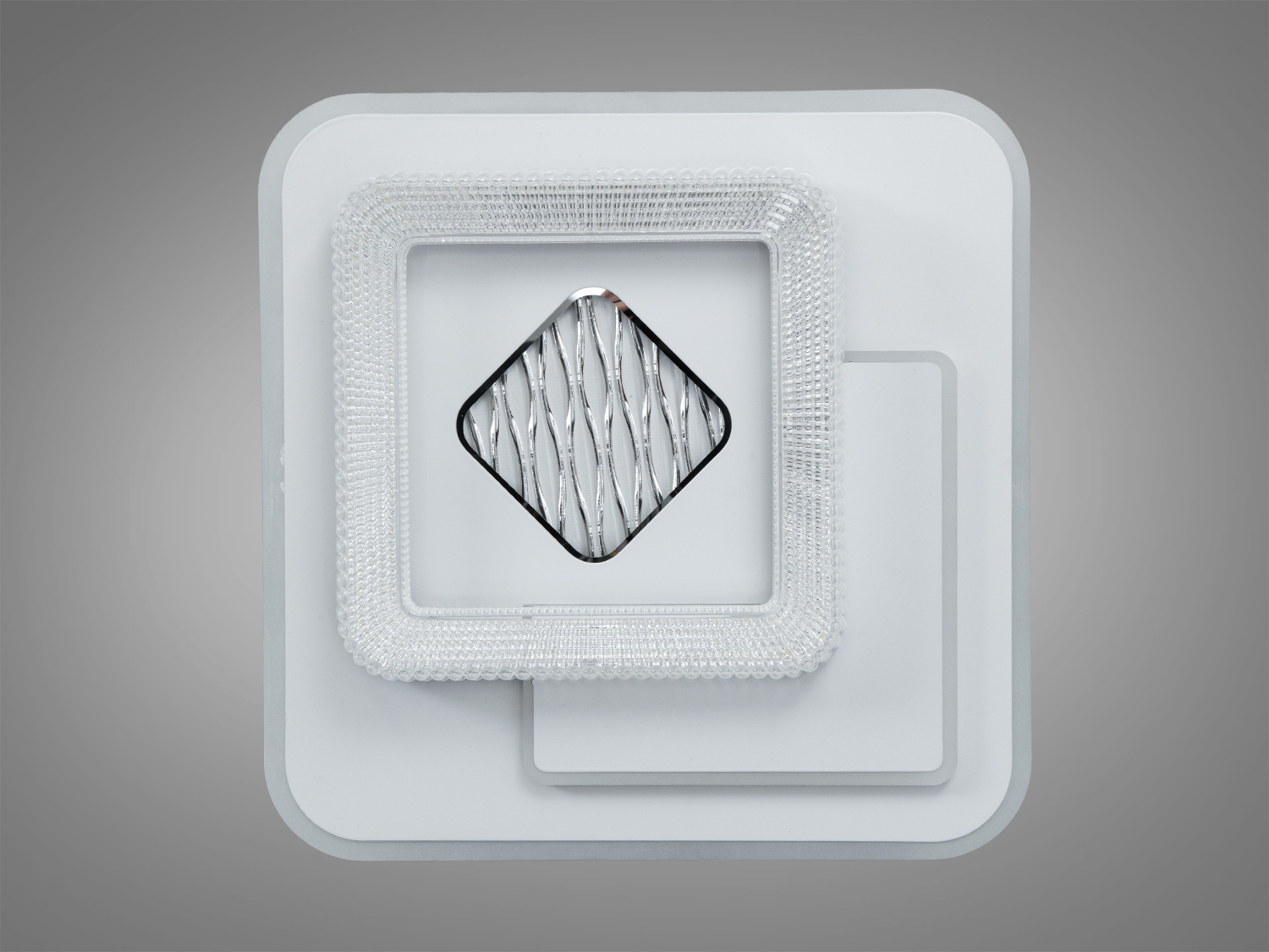 Компактний світильник з центральним декоративним елементом у формі ромба. Підходить для невеликих приміщень.