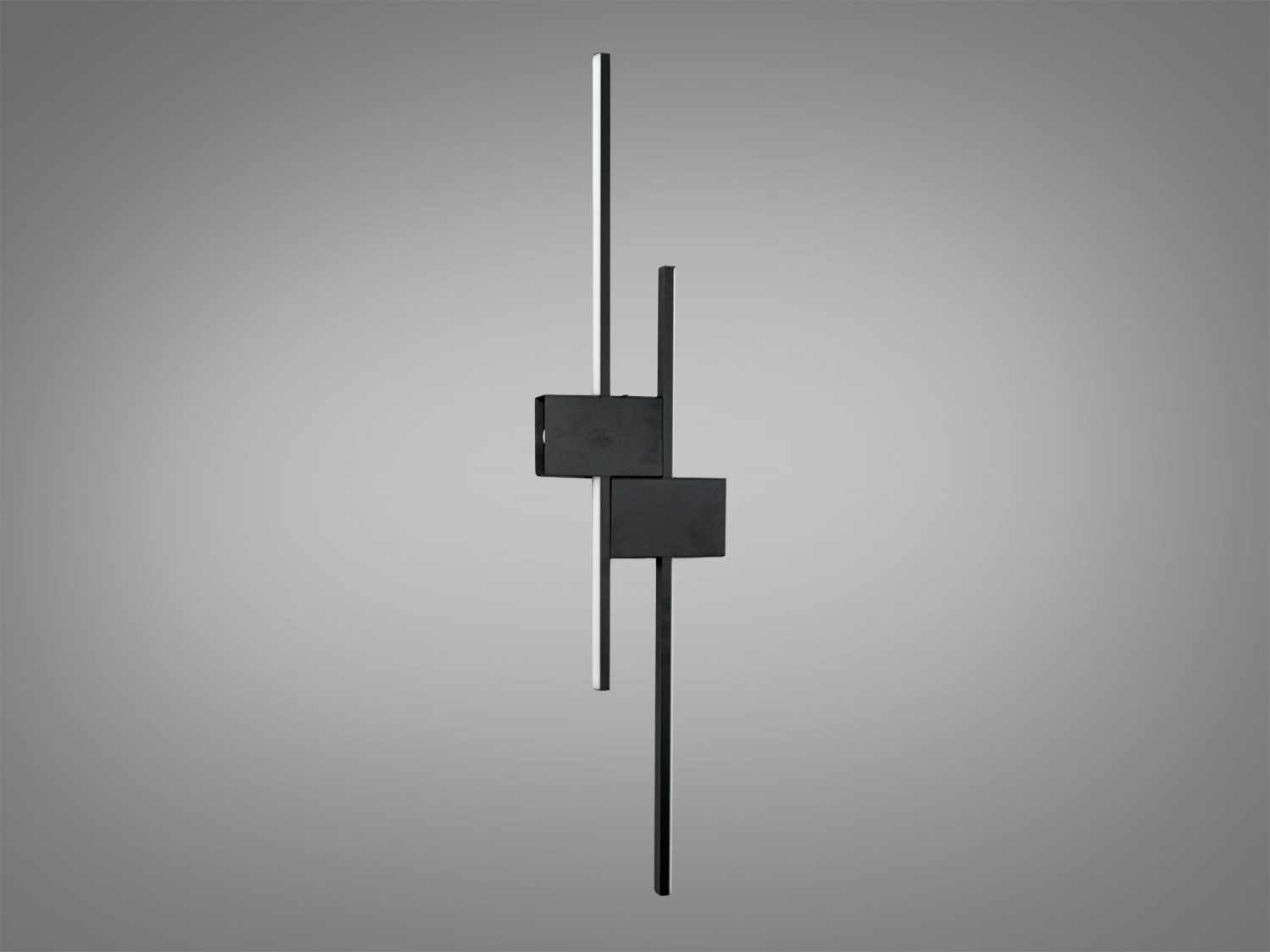 Вертикальний настінний світильник з чорним корпусом, що підкреслює строгий стиль інтер′єру.