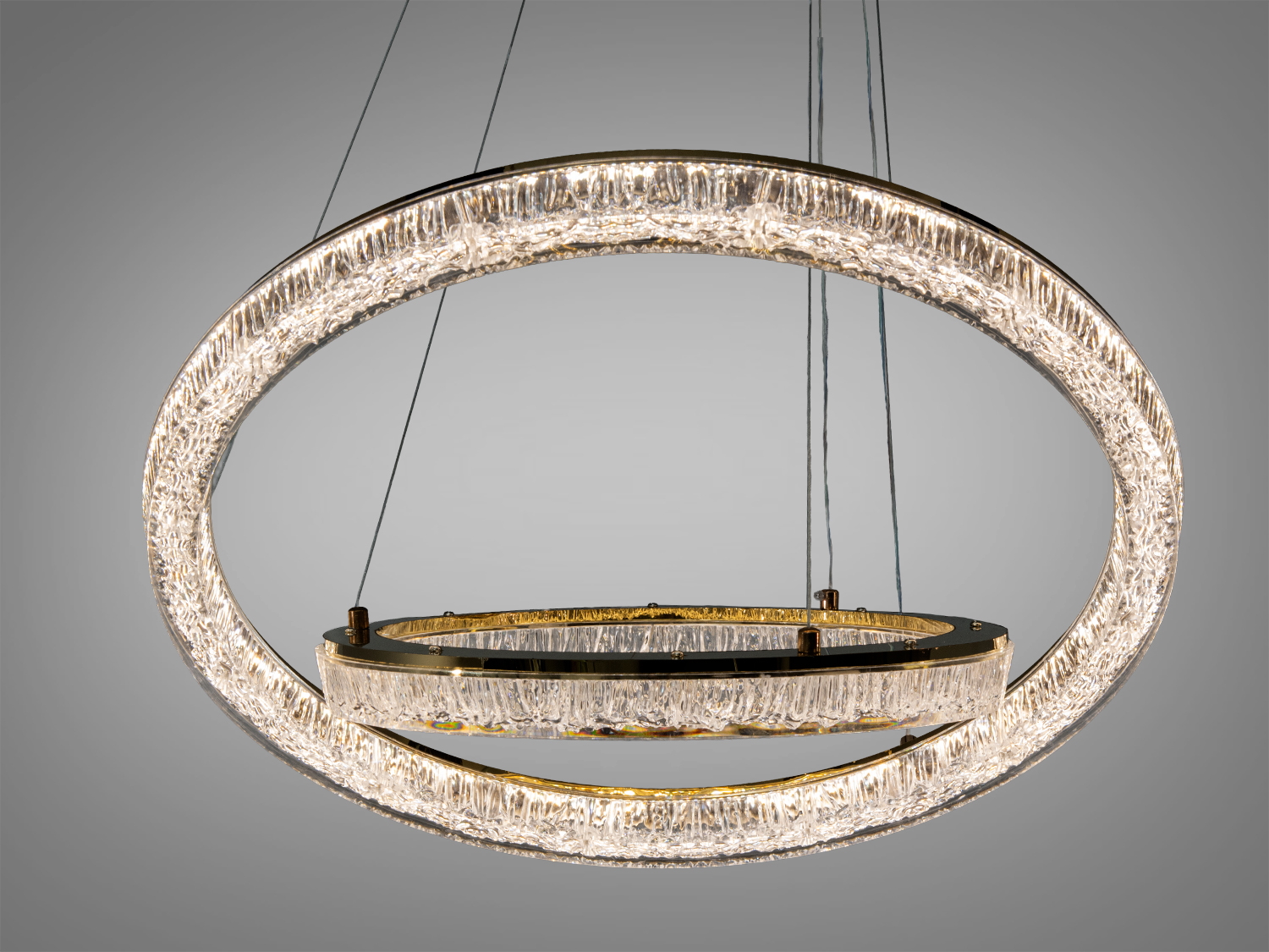 Підвісна люстра з двома кільцями, що випромінюють нейтральне світло, підходить для офісних приміщень.