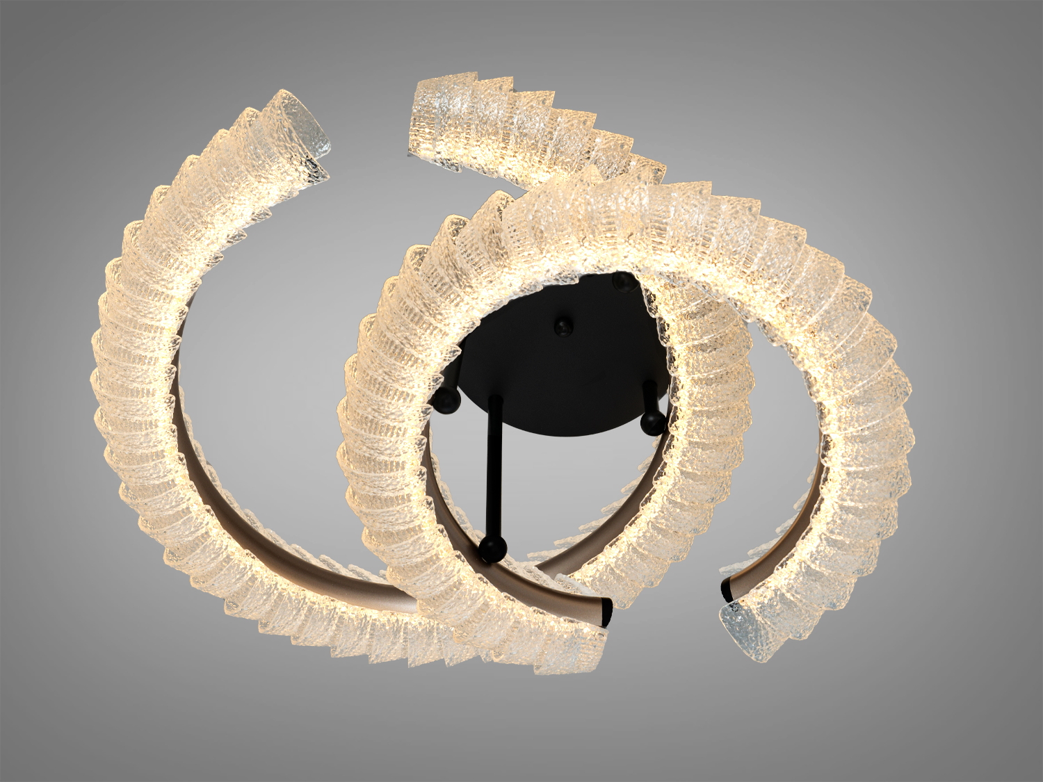 LED світильник з двома овальними кільцями, що випромінюють тепле світло. Металевий корпус, ідеальний для вітальні або спальні.