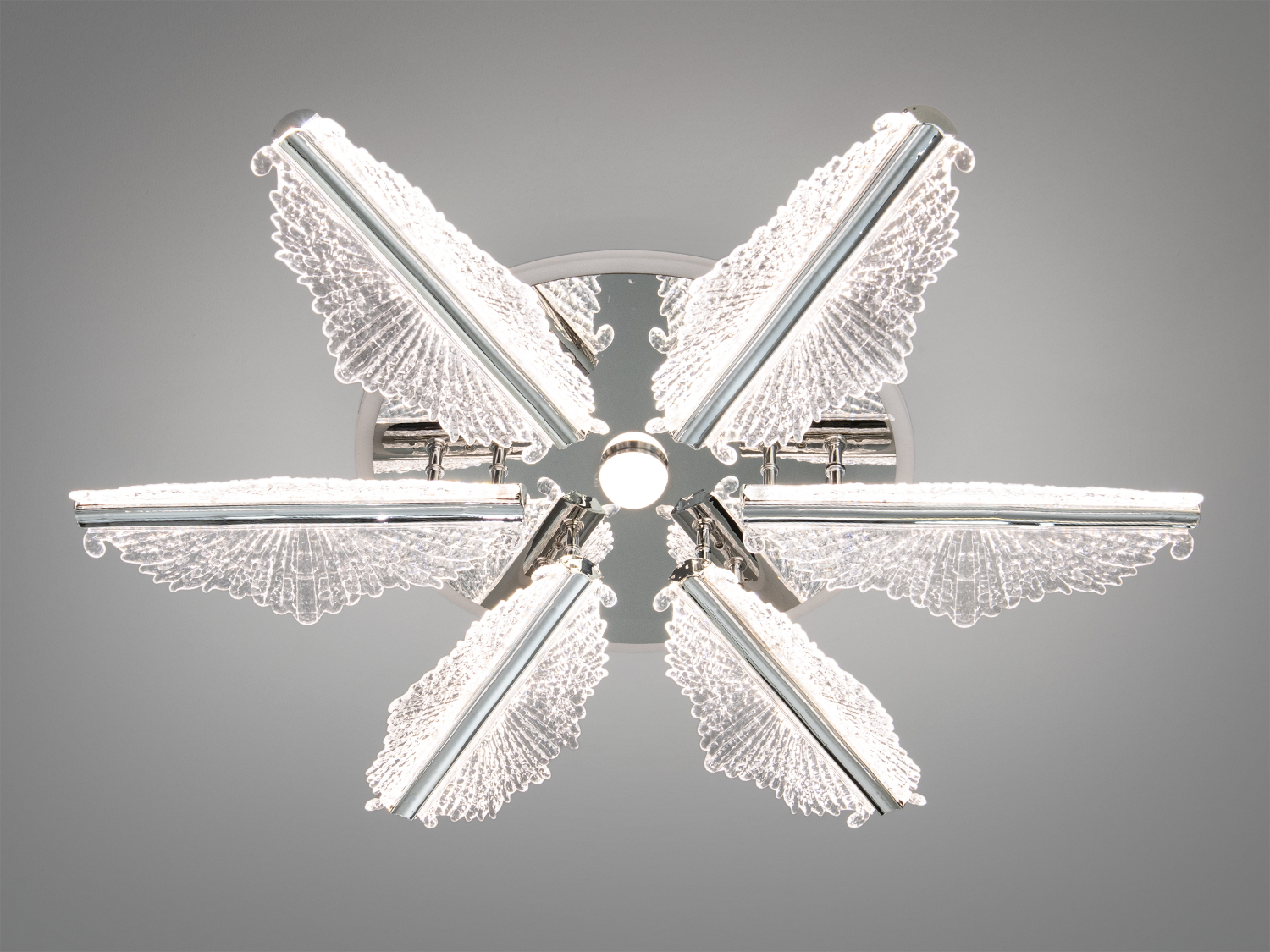 Стельовий світильник у формі квітки, прозорі акрилові пелюстки, нейтральне світло, кругла основа для монтажу.