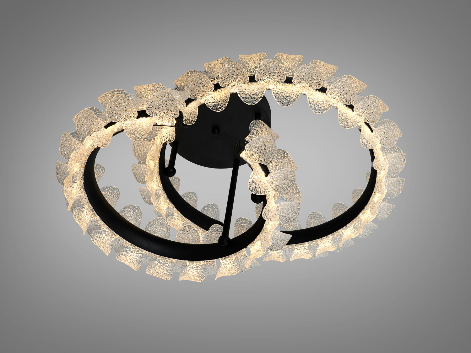 LED світильник з двома овальними кільцями, що випромінюють тепле світло. Металевий корпус, ідеальний для вітальні або спальні.