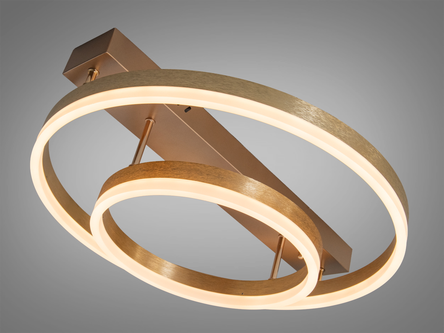 Стельовий світильник з теплим LED освітленням, два круглих кільця, золотистий метал, підвісний монтаж, для спальні.