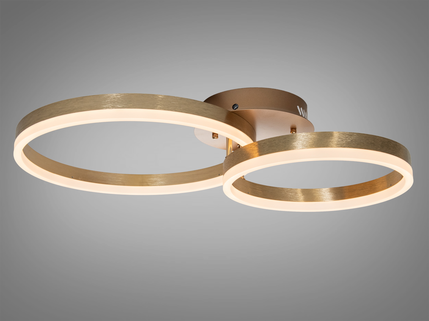 Два круглих LED кільця світильника з теплим білим світлом, ідеальні для створення затишної атмосфери в кімнаті.