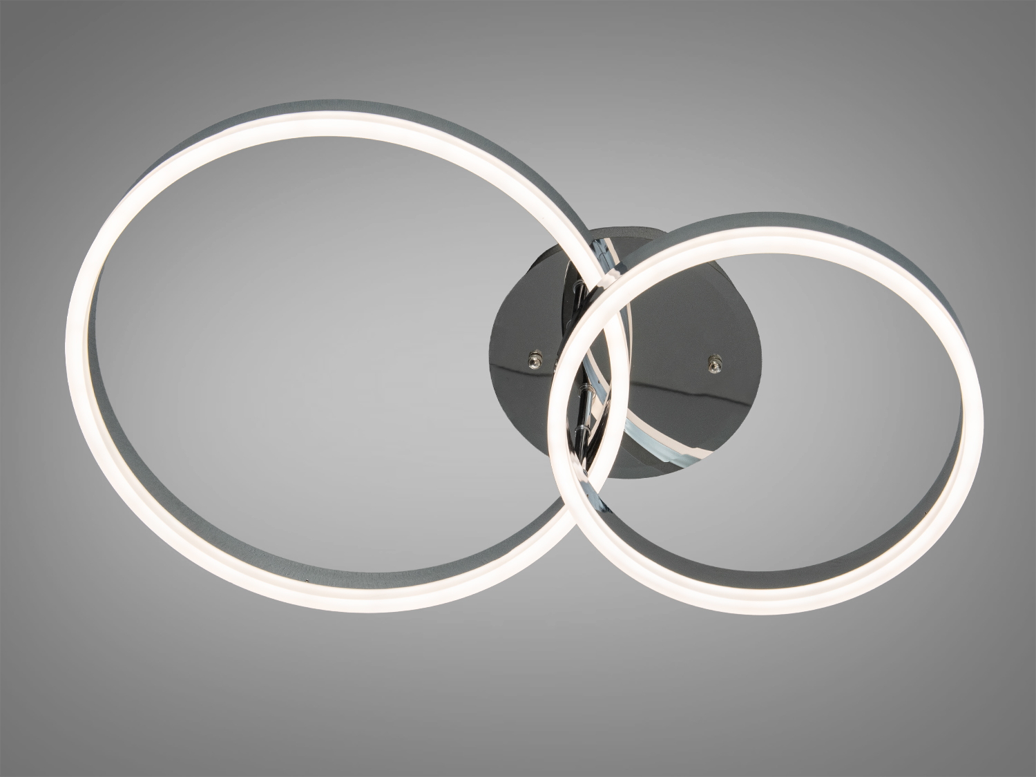 Стельовий світильник з двома переплетеними акриловими LED-кільцями, що підходить для сучасних інтер′єрів. Встановлюється на стелю.