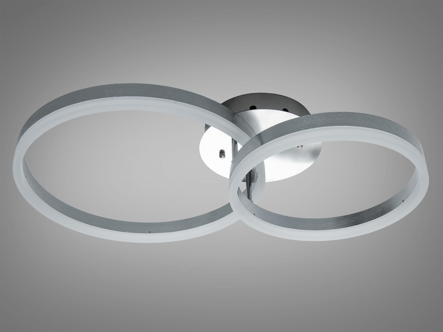 Мінімалістичний стельовий світильник з двома прозорими круглими кільцями. Підходить для будь-якого сучасного інтер′єру.