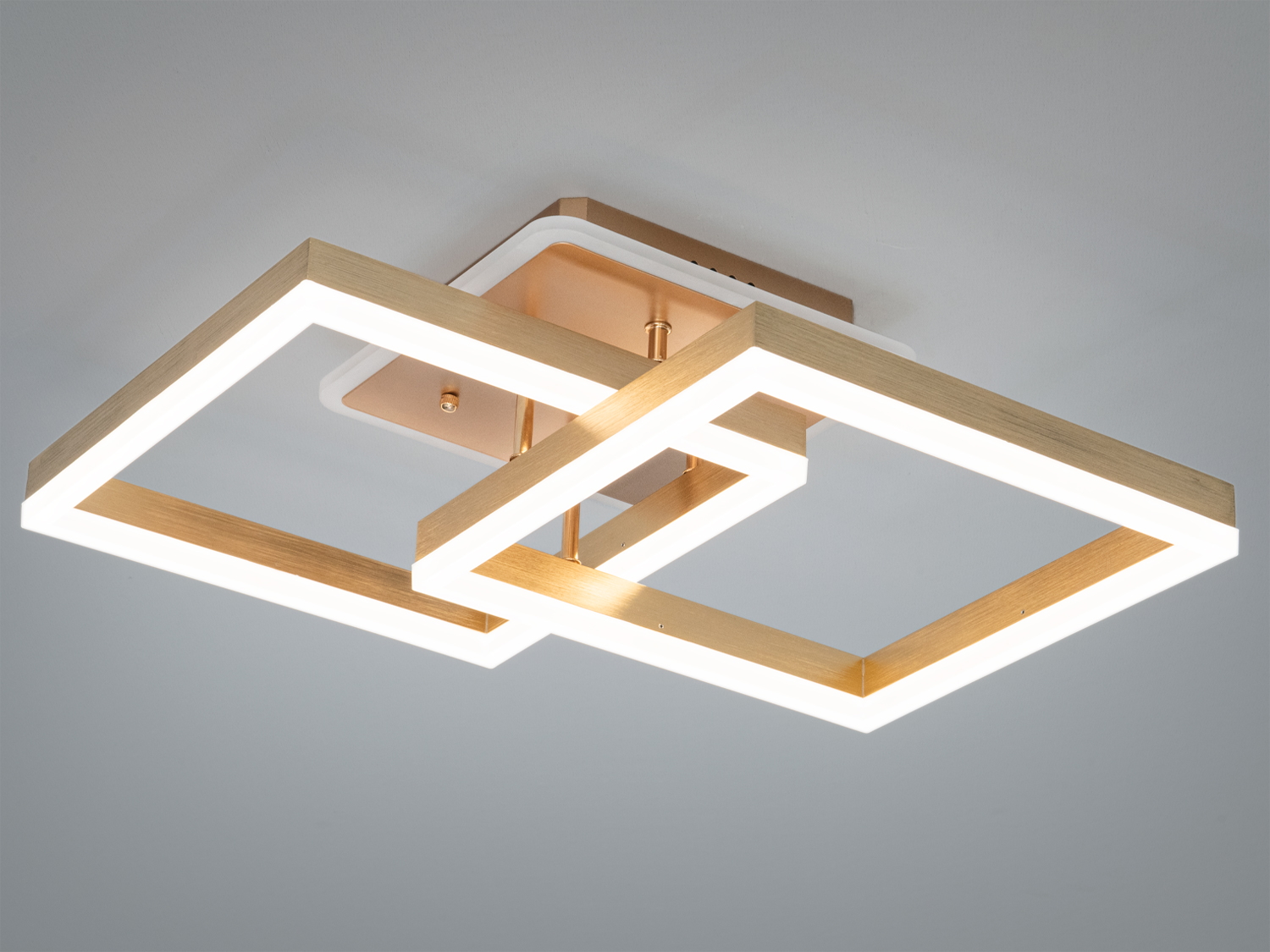 Світильник з двома квадратними акриловими рамками, що перетинаються, з пультом керування та білим підсвічуванням для сучасного інтер′єру.