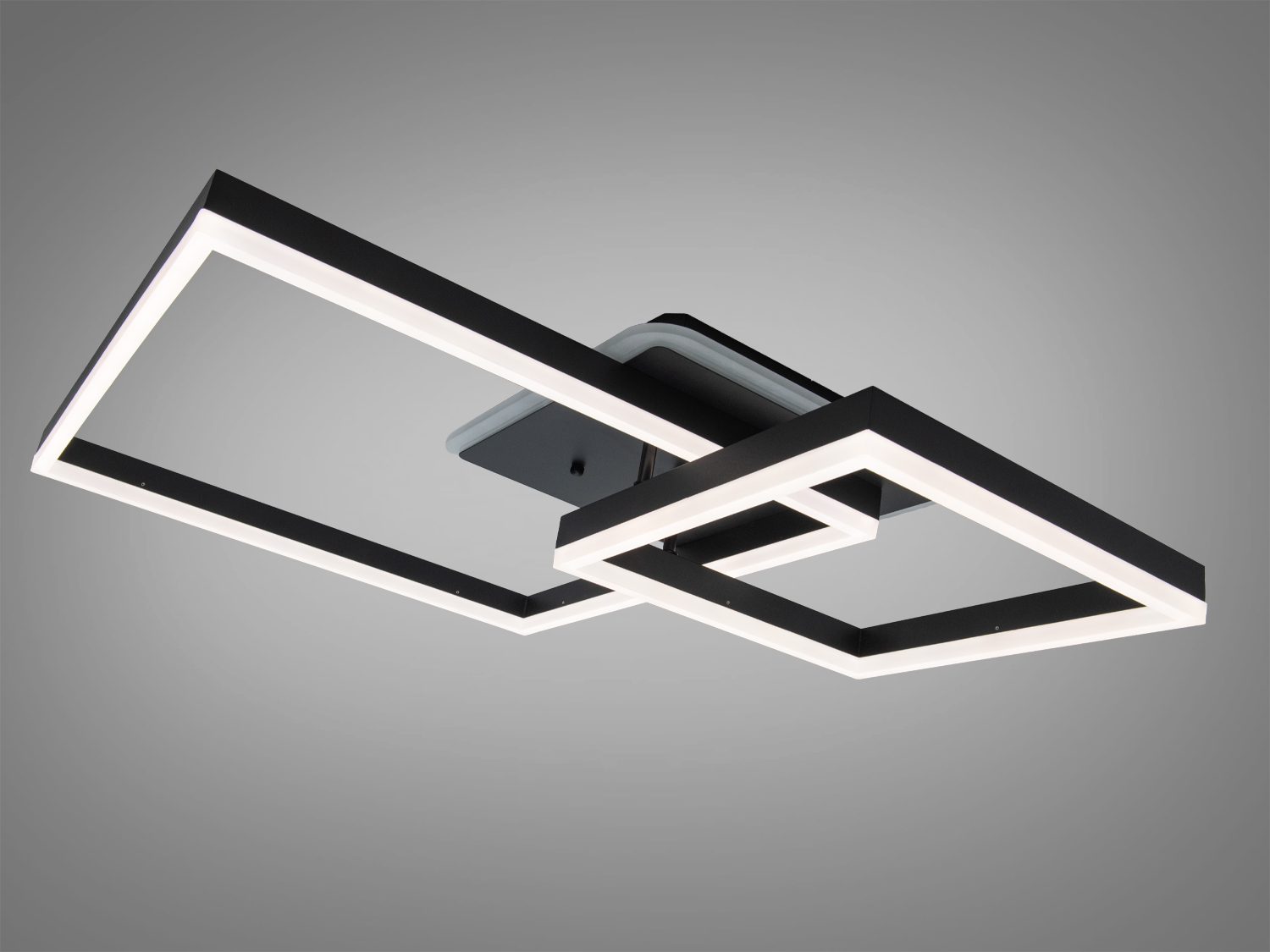 Світильник з двома квадратами, що накладаються, забезпечує рівномірне освітлення, підходить для офісного простору.