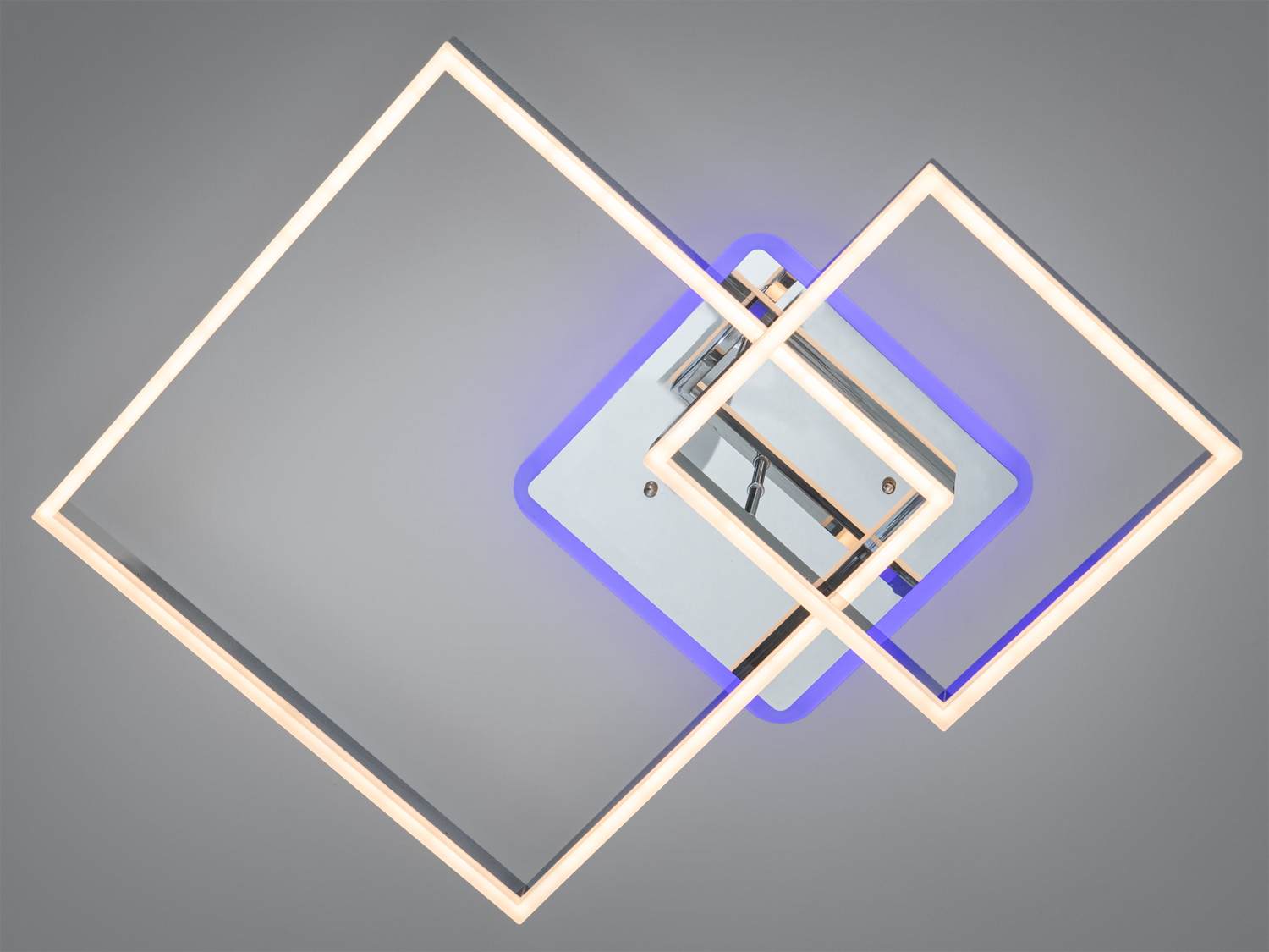 Стельова лампа з двома квадратними рамками, що створює тепле світло, ідеально підходить для вітальні.