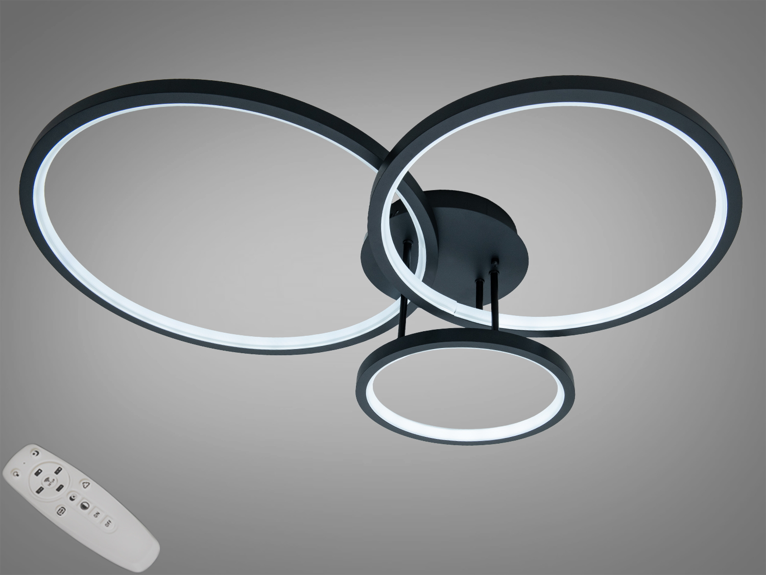 Стельова LED-люстра 84 W з трьома кільцями у чорному кольорі. Пульт і димер для регулювання яскравості, оптимально для кімнат до ~14 м².