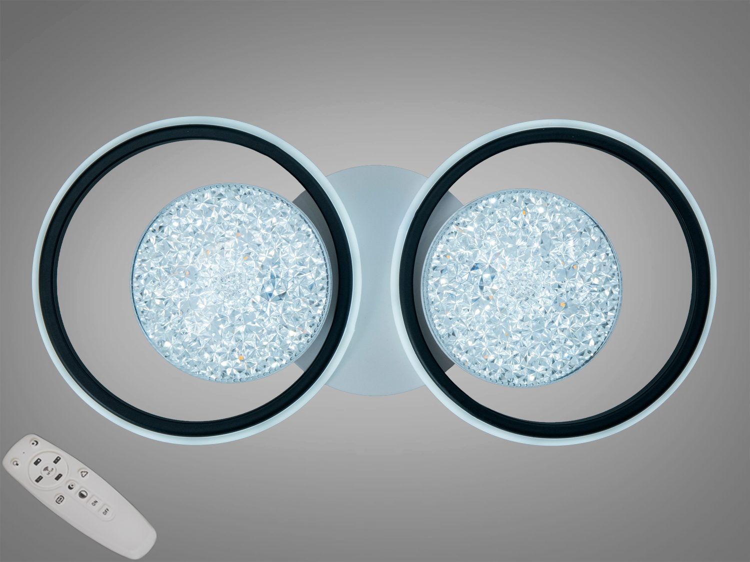 Світильник з двома круглими LED лампами в кристалічних плафонах, що регулюються пультом дистанційного керування.