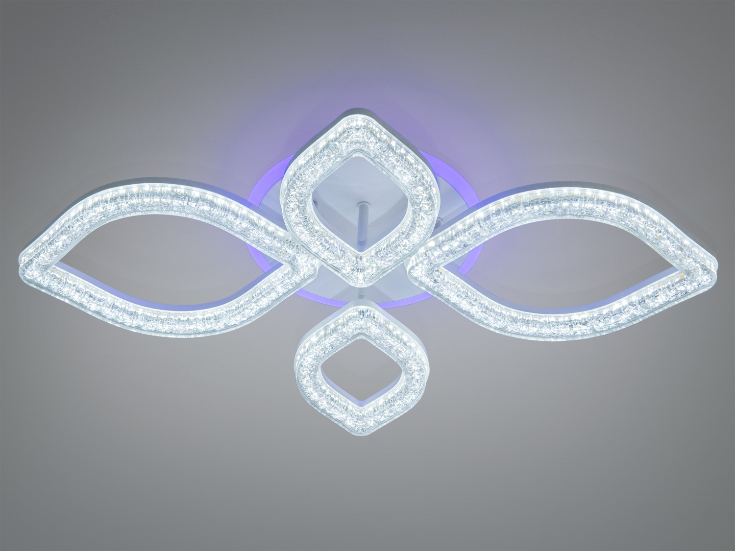 Світильник з білим світлом, виконаний у формі чотирьох акрилових листків. Має фіолетовий акцентний світлодіод для додаткового стилю.