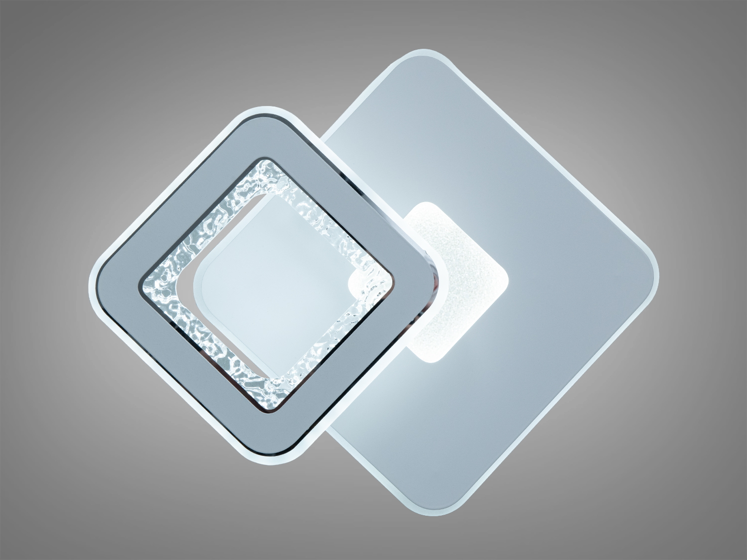 Настінний світильник з двома квадратами, один з яких має матову поверхню. Призначений для сучасних інтер′єрів.