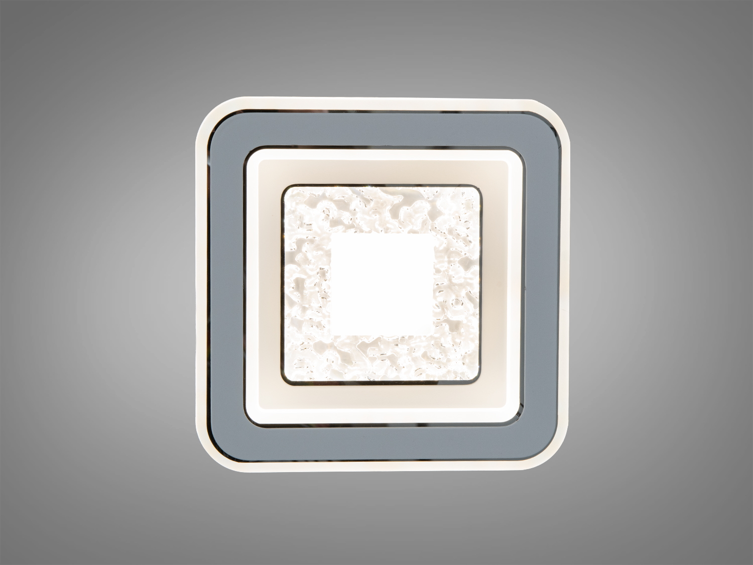 Потолочний світильник з квадратним дизайном і матовими краями. Ідеальний для офісного приміщення або вітальні.