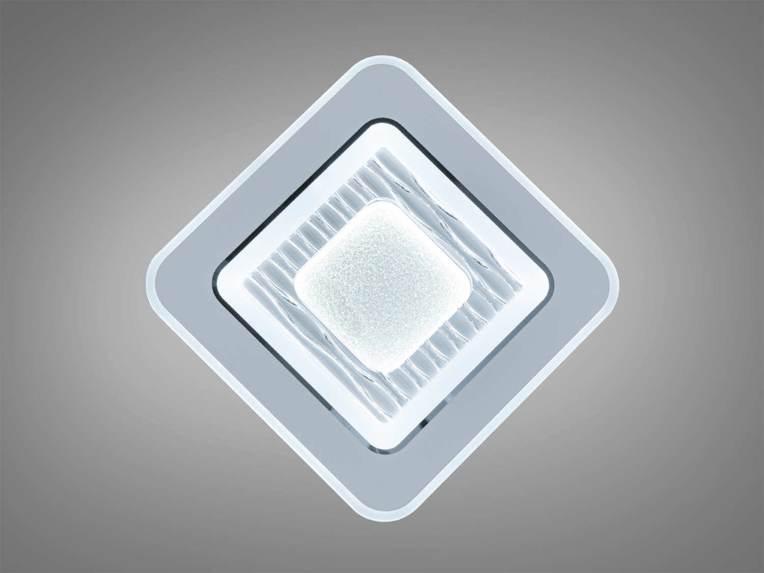 Дизайнерський світильник з білим холодним світлом, підходить для офісних приміщень.