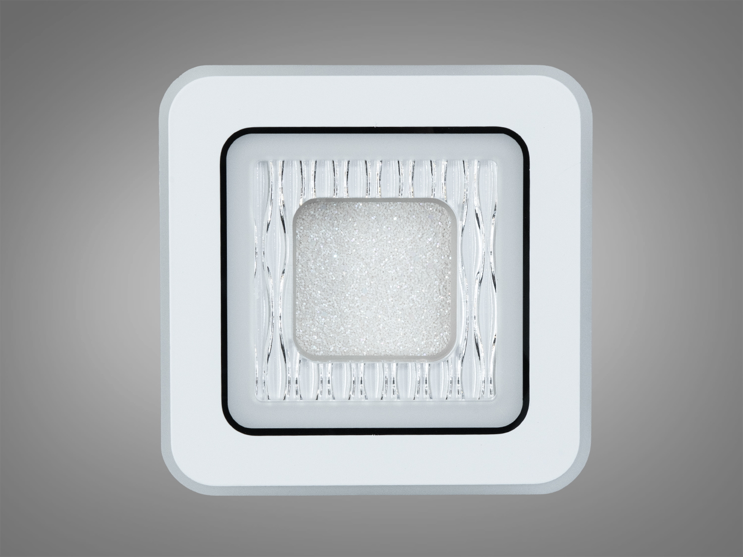 Компактний світильник з текстурованою поверхнею, забезпечує рівномірне освітлення.