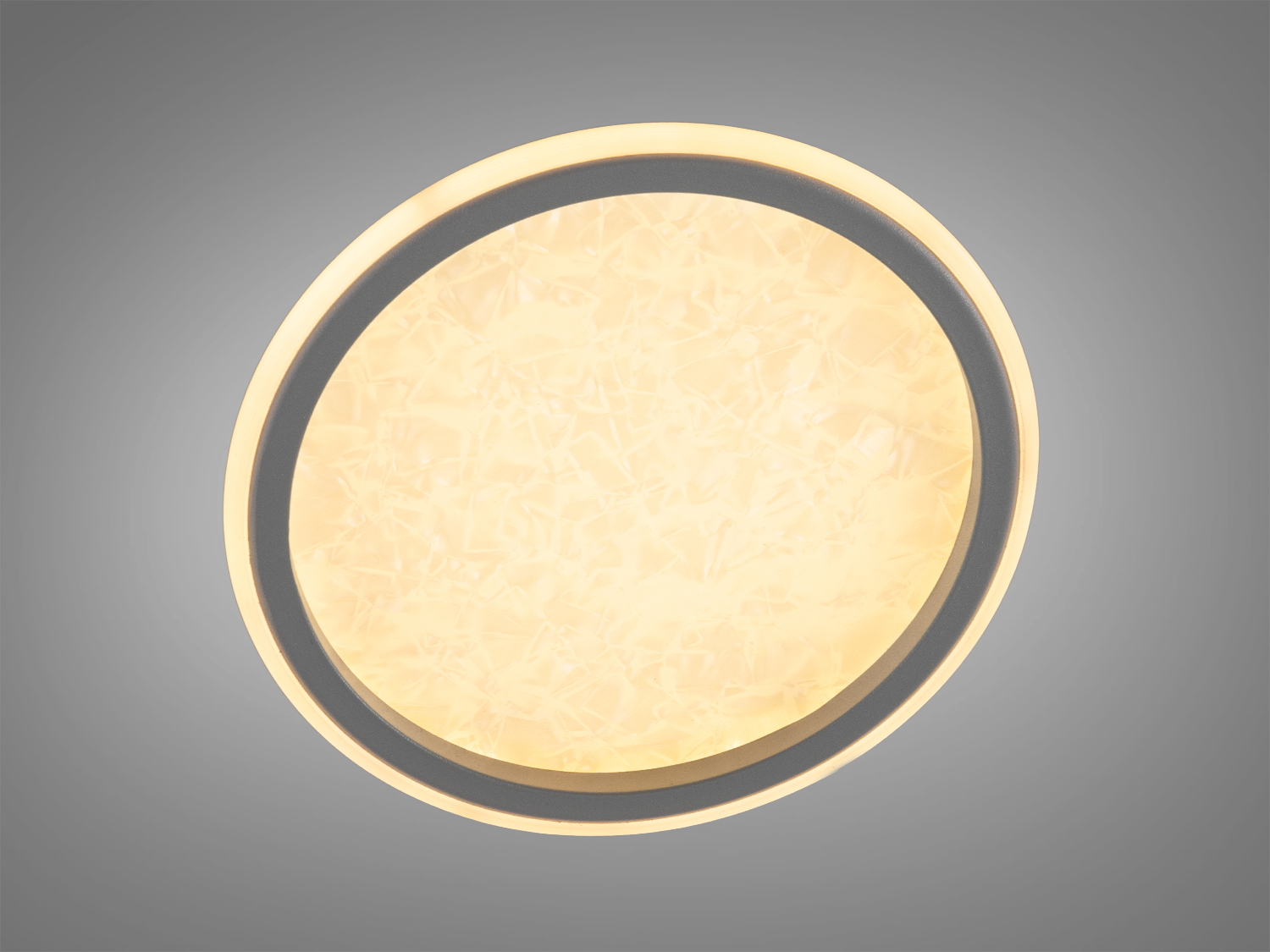 Світильник із теплим жовтим світлом, круглої форми. Підходить для затишного освітлення вітальні або спальні.