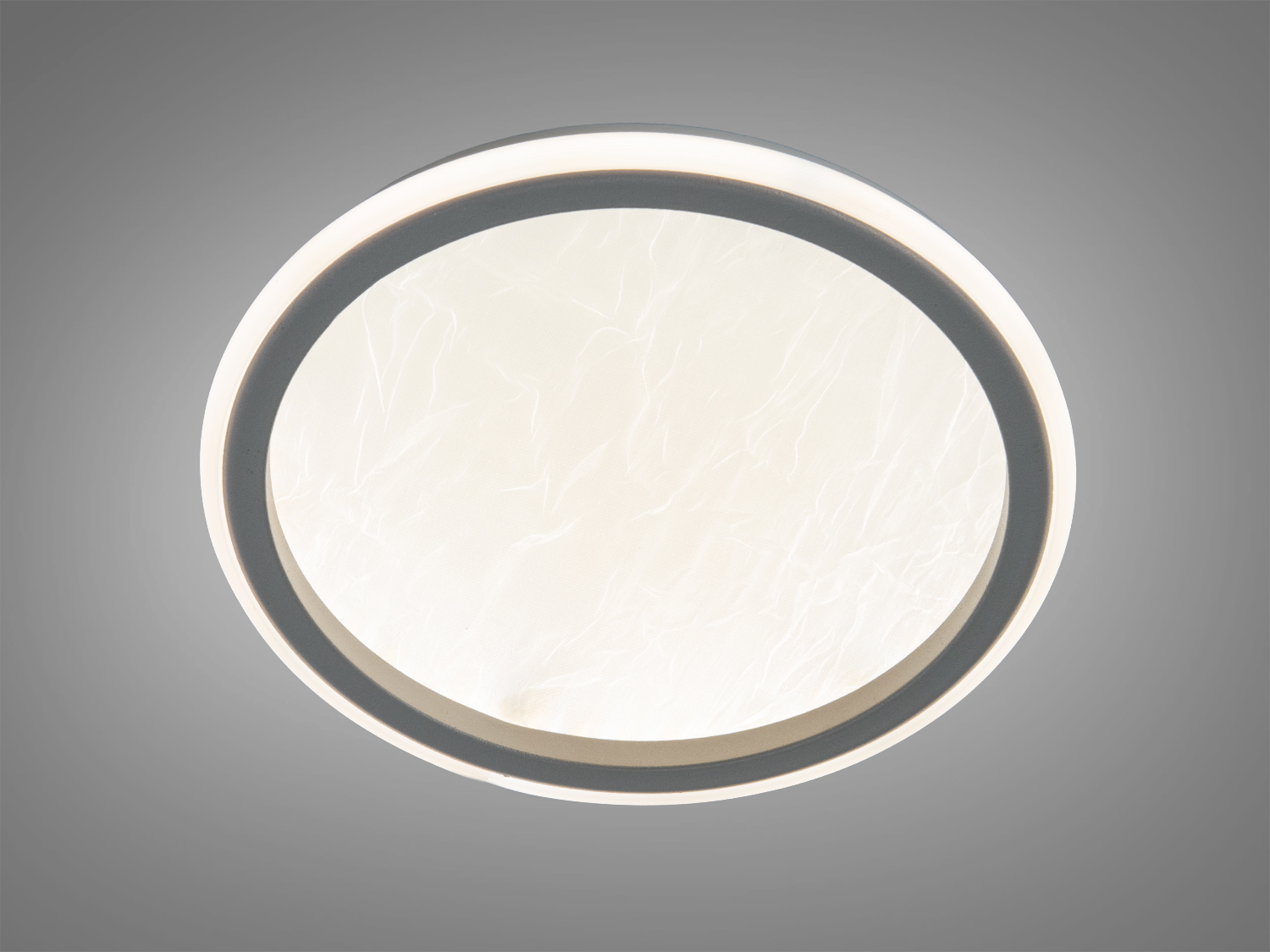 Світлодіодний світильник круглої форми з теплим білим світлом. Ідеальний для затишного освітлення вітальні або спальні.