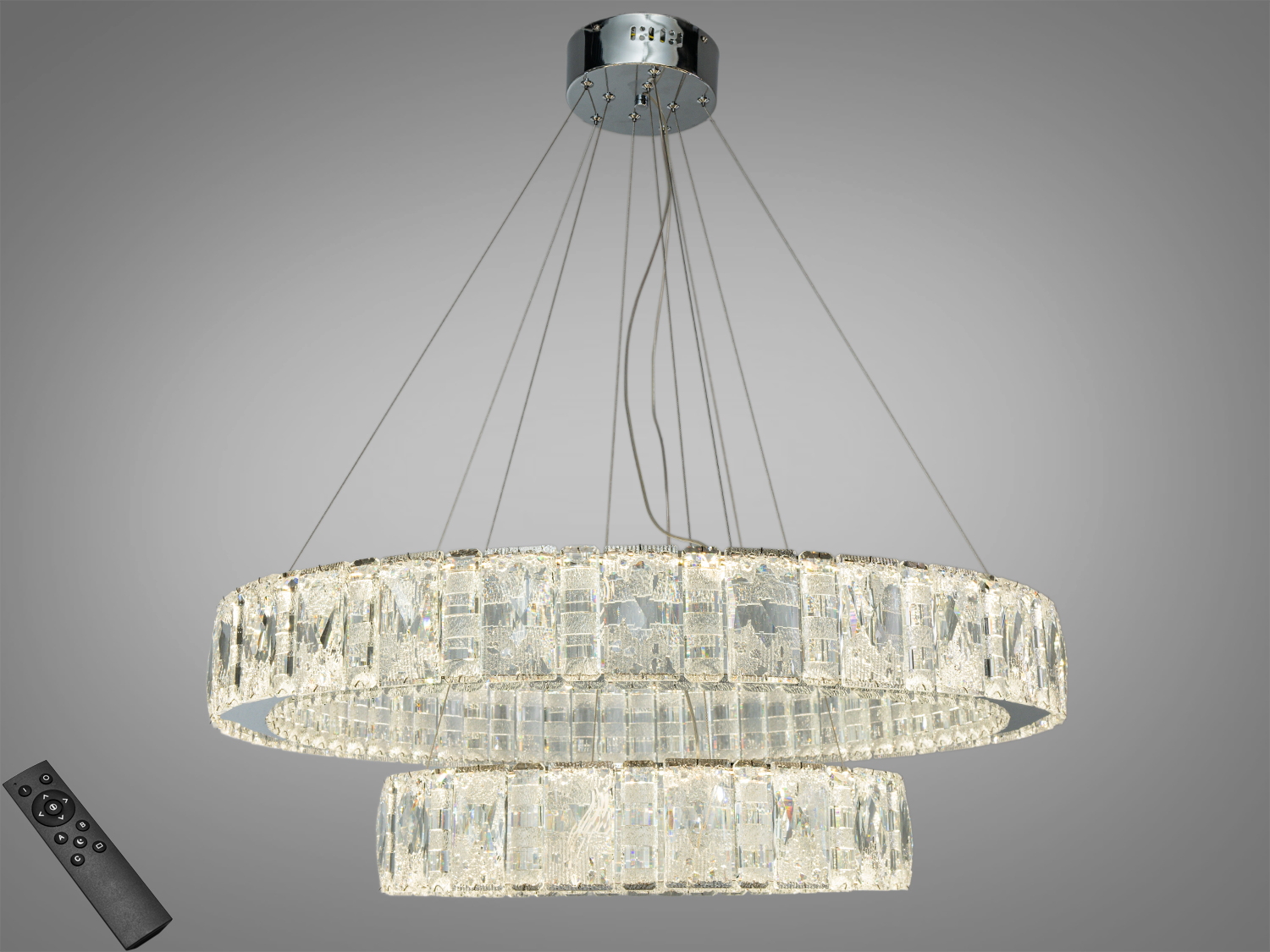 Світлодіодна люстра з двома кільцями, прикрашеними кришталевими елементами. Має дистанційне керування для зручного налаштування освітлення.