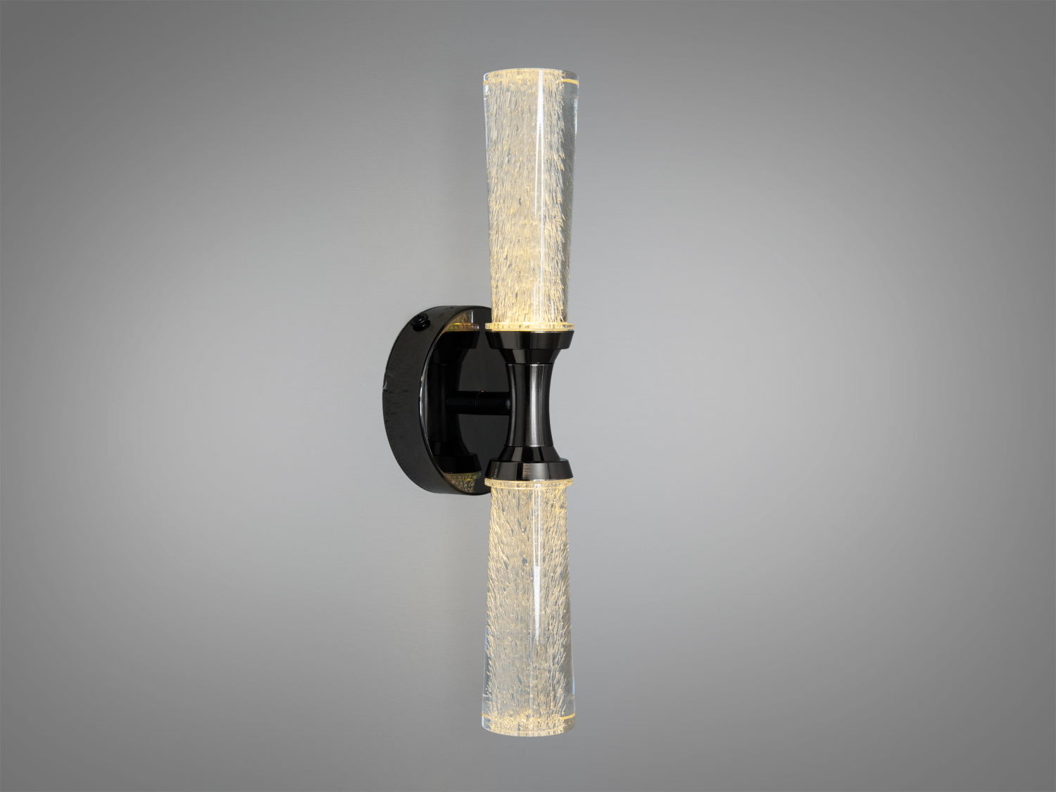 Настінний LED бра у чорному хромі з циліндричними скляними плафонами, потужність близько 5 Вт. Підходить для акцентного освітлення в сучасних інтер’єрах.