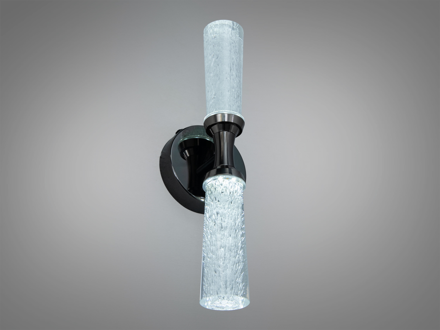 Дизайнерський світильник з двома циліндричними плафонами, що випромінюють холодне світло. Підходить для офісних приміщень.