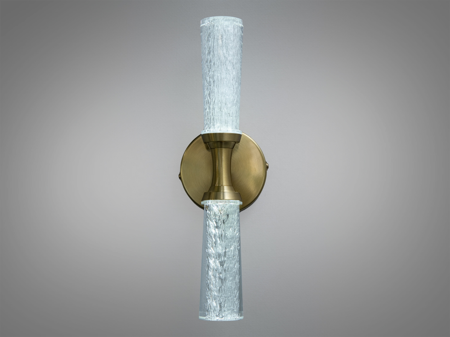 Бра з вертикально розташованими скляними плафонами та круглою основою. Метал бронзового кольору. Ідеально для освітлення коридорів.