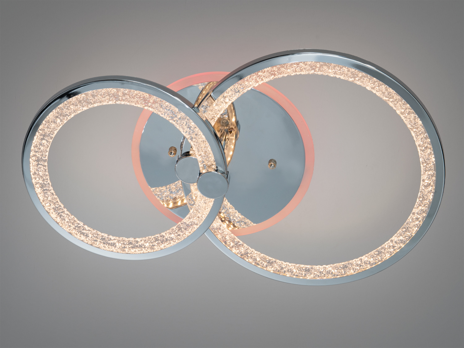 Стельовий світильник з двома кільцями, що має змінне кольорове підсвічування, підходить для сучасних інтер′єрів.
