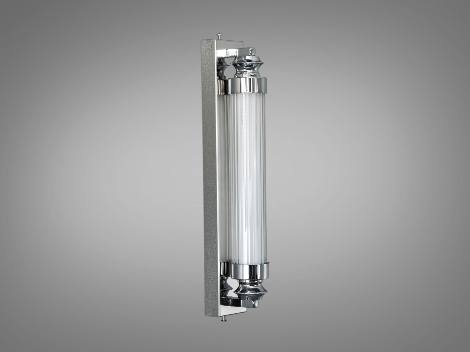 Настінний світильник з двома вертикальними трубками, наповненими бульбашками. Хромований корпус додає сучасного стилю.