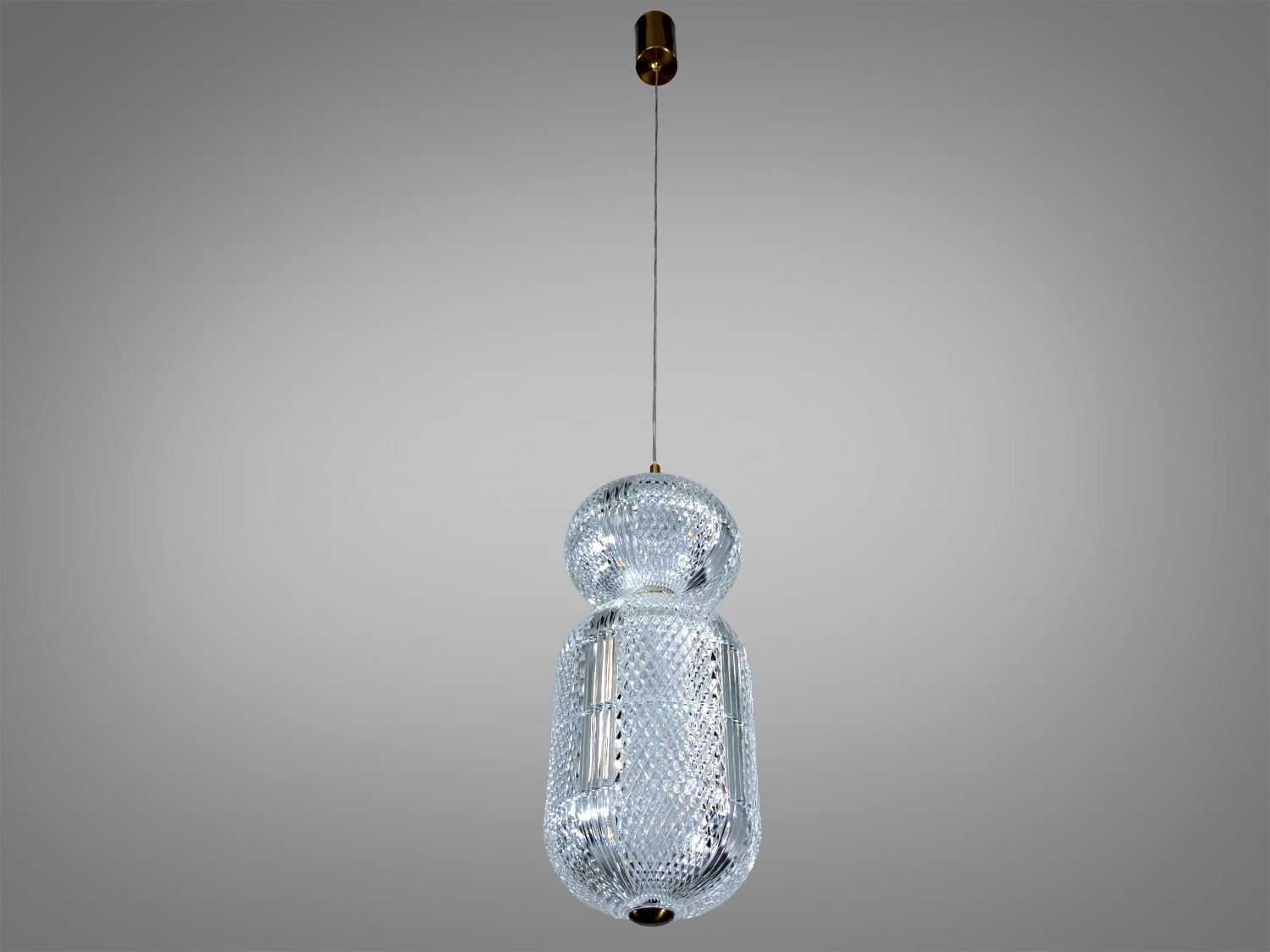 Підвісний світильник з візерунковим склом, що створює м′яке освітлення, ідеальний для вітальні.