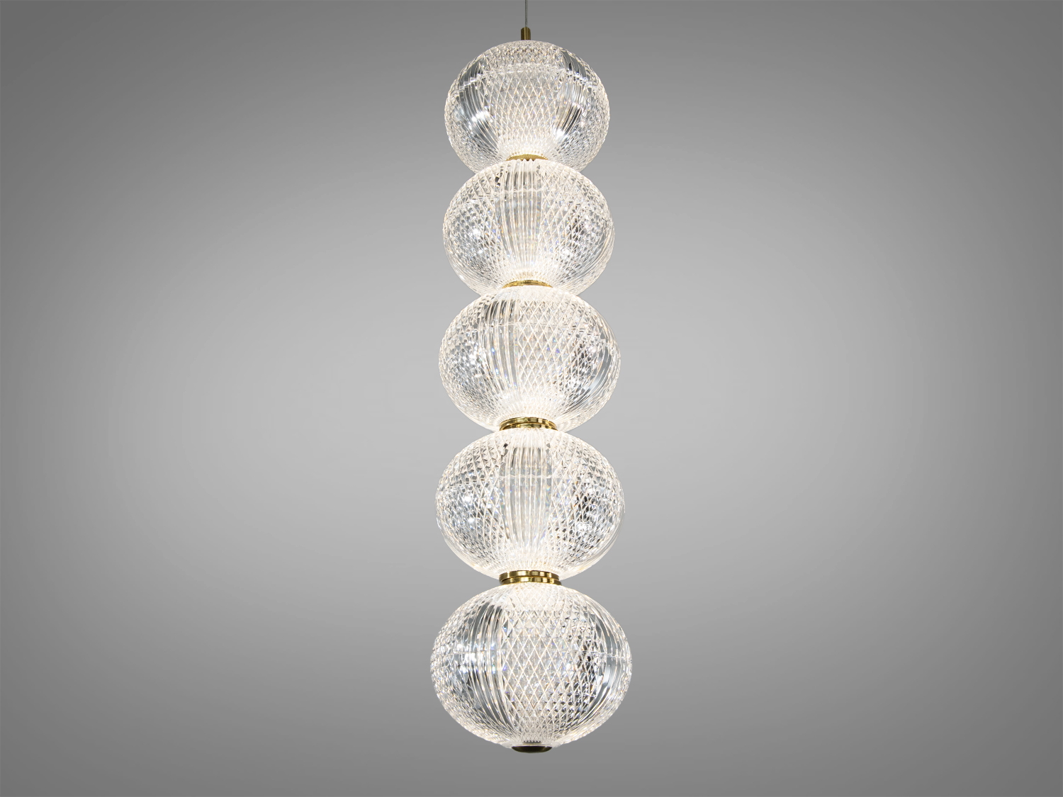 Підвісний світильник з п′яти скляних куль із рельєфною текстурою, підходить для сучасного інтер′єру.