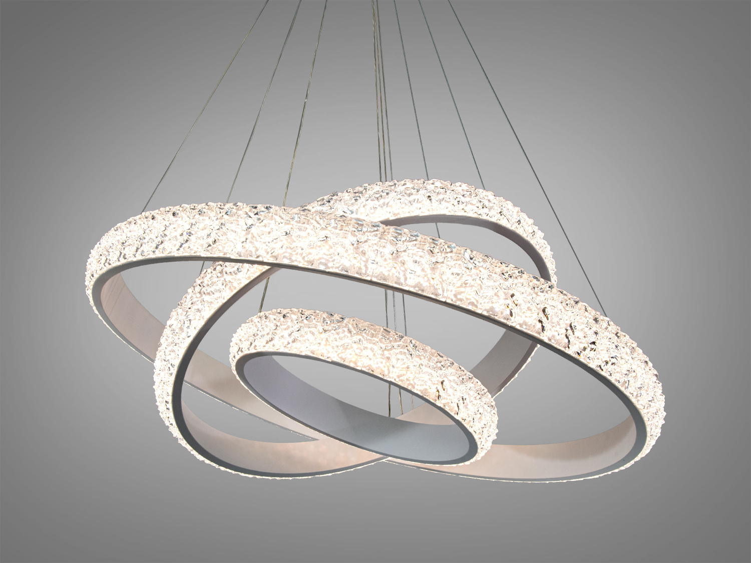 Підвісний світильник із трьома кільцями, що мають текстуровану поверхню. Призначений для сучасних інтер′єрів.