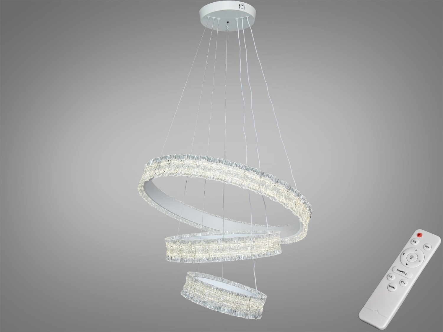 Підвісний світильник з трьома акриловими кільцями, оснащений дистанційним керуванням. Акрил створює цікавий ефект, підходить для сучасних інтер′єрів.
