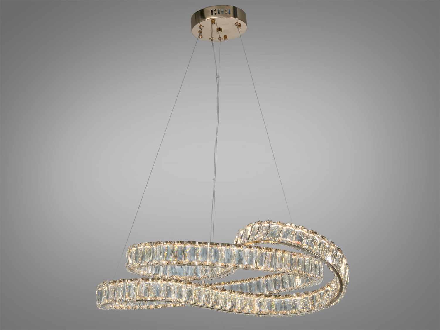 Підвісна люстра з кристалами, спіральна форма, кріплення до стелі на тросах, підходить для сучасних інтер′єрів.