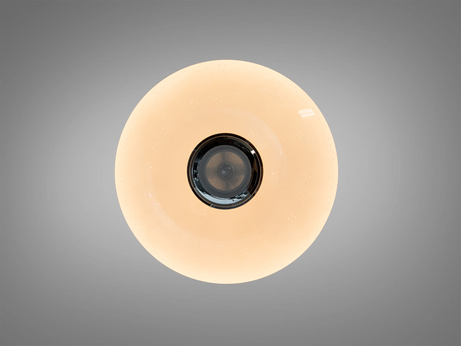 Стельова лампа з теплим жовтим світлом, круглої форми, відмінно підходить для затишного освітлення в домашньому інтер′єрі.