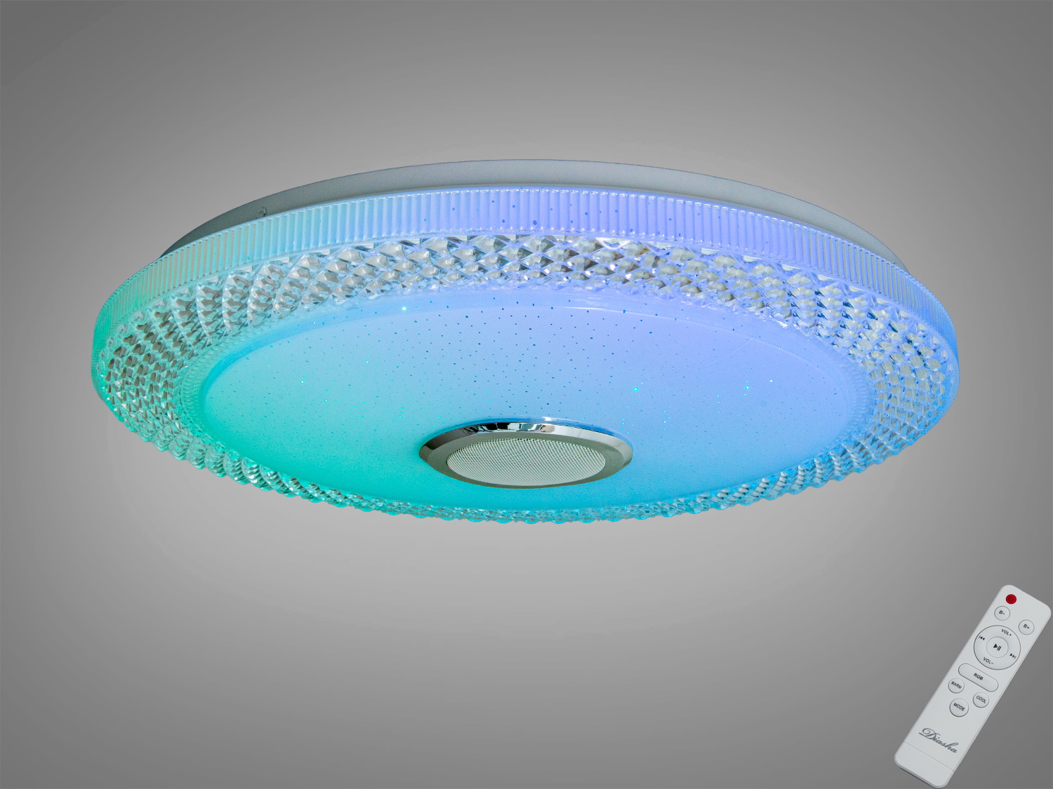 Кругла стельова лампа з пультом дистанційного керування, має декоративну обробку з кристалами та різнокольорове освітлення.