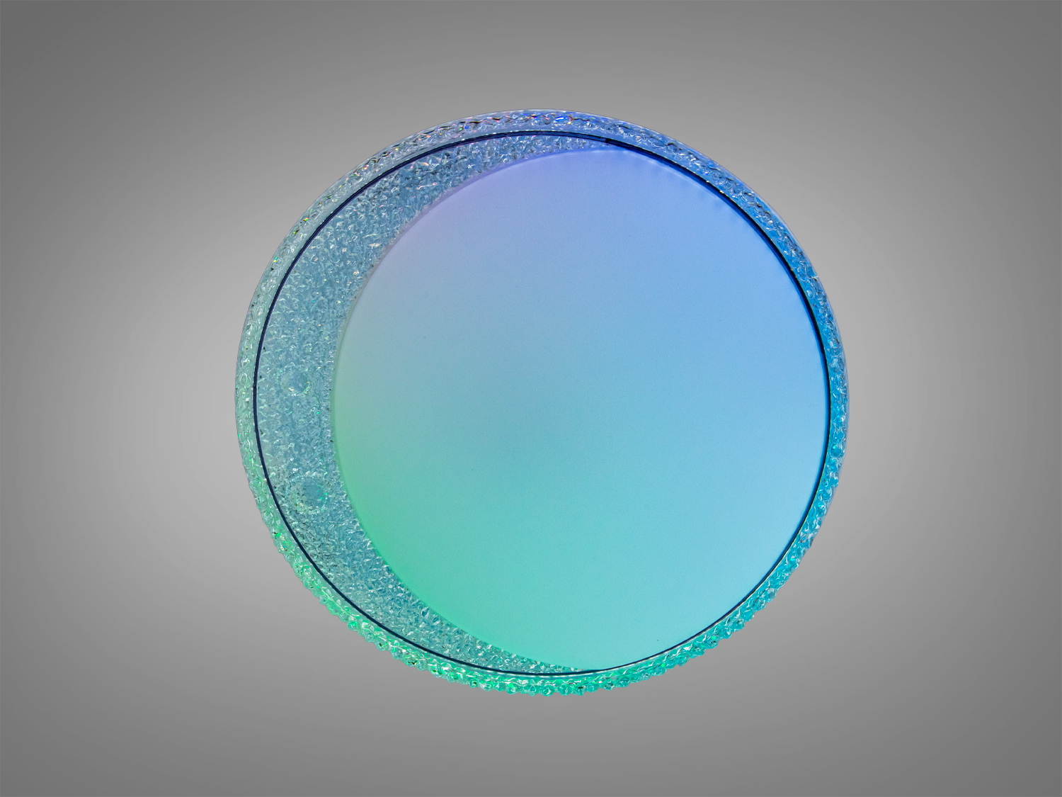 Кругла лампа з кристалічним обідком, оснащена RGB підсвічуванням, що змінює кольори, підходить для динамічних інтер′єрів.