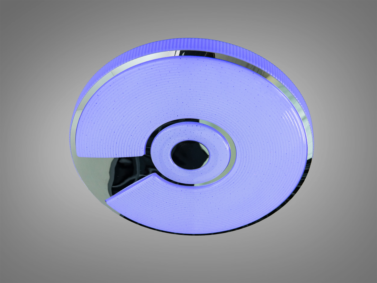 Стельова лампа круглої форми з фіолетовим світлом, має сріблясті акценти. Призначена для сучасних інтер′єрів з можливістю дистанційного керування.