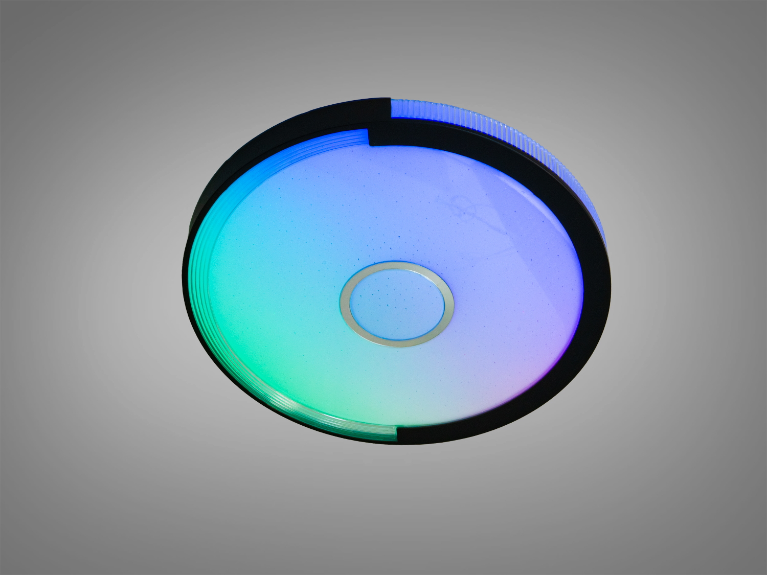 Кругла лампа з кольоровим світлом, що створює атмосферу. Має дистанційне керування для зручності.