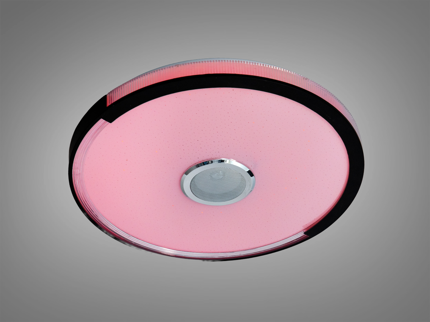 Круглий світильник з рожевим світлом, підходить для монтажу на стелю. Ідеальний для створення затишної атмосфери.