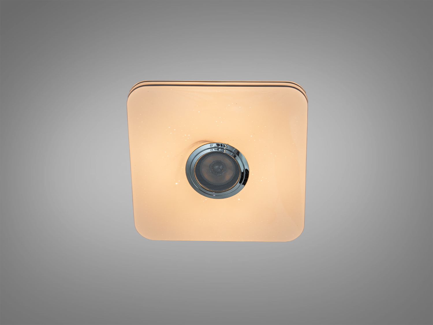 Стельова лампа квадратної форми з теплим жовтим світлом, має вбудований динамік для музики, ідеальна для затишного освітлення.