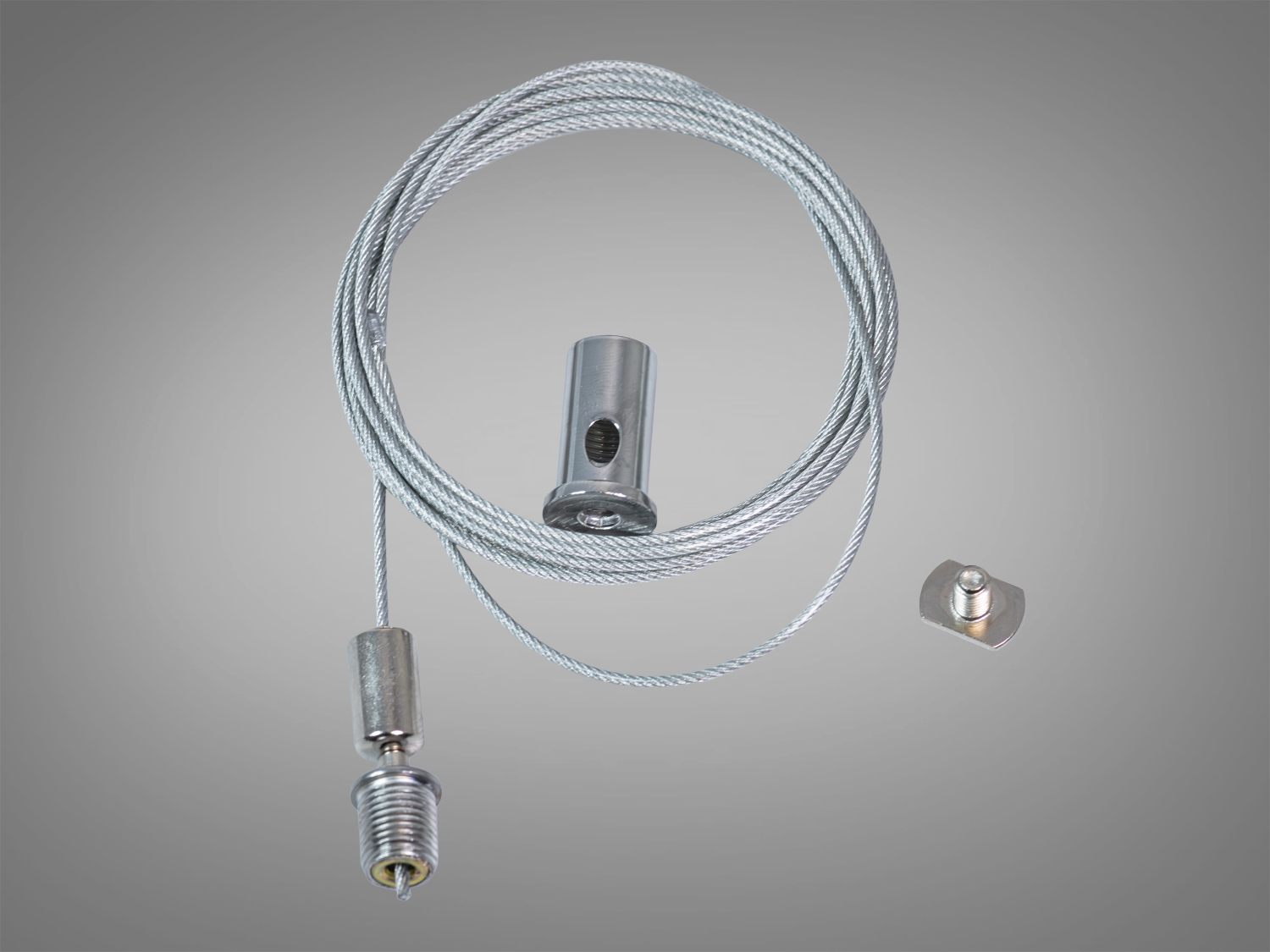 Тросовий підвіс Diasha з Т‑подібним гвинтом і кліпсою швидкого монтажу. Два троси, регульована висота, без свердління шинопроводу. Для треків 220 В і LED‑профілів.