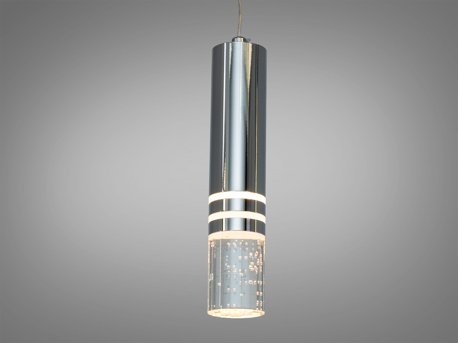 Одинарний підвісний світильник з прозорою нижньою частиною із акрилу, що створює ефект бульбашок.