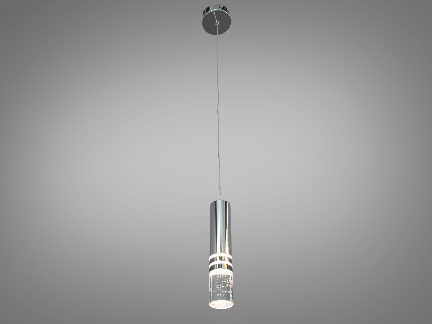 Підвісний світильник з акрилу, оснащений світлодіодним джерелом світла.