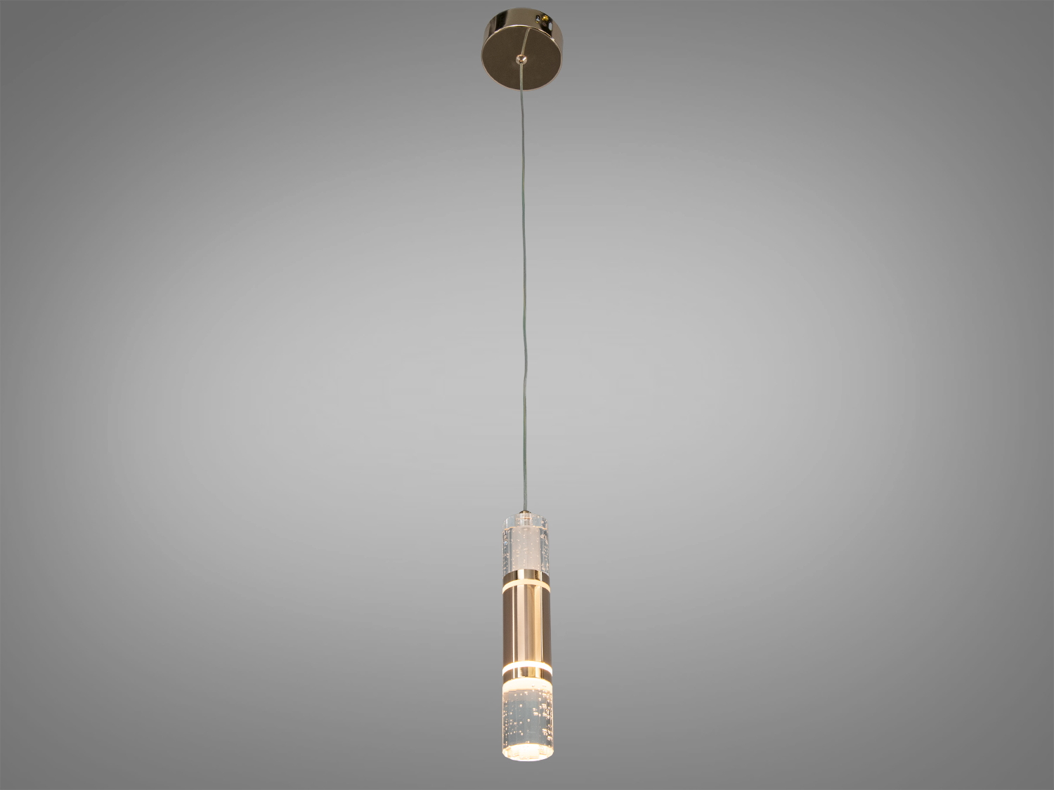 Підвісний світильник на тонкому дроті, забезпечує точкове освітлення, ідеальний для кухні або барної стійки.