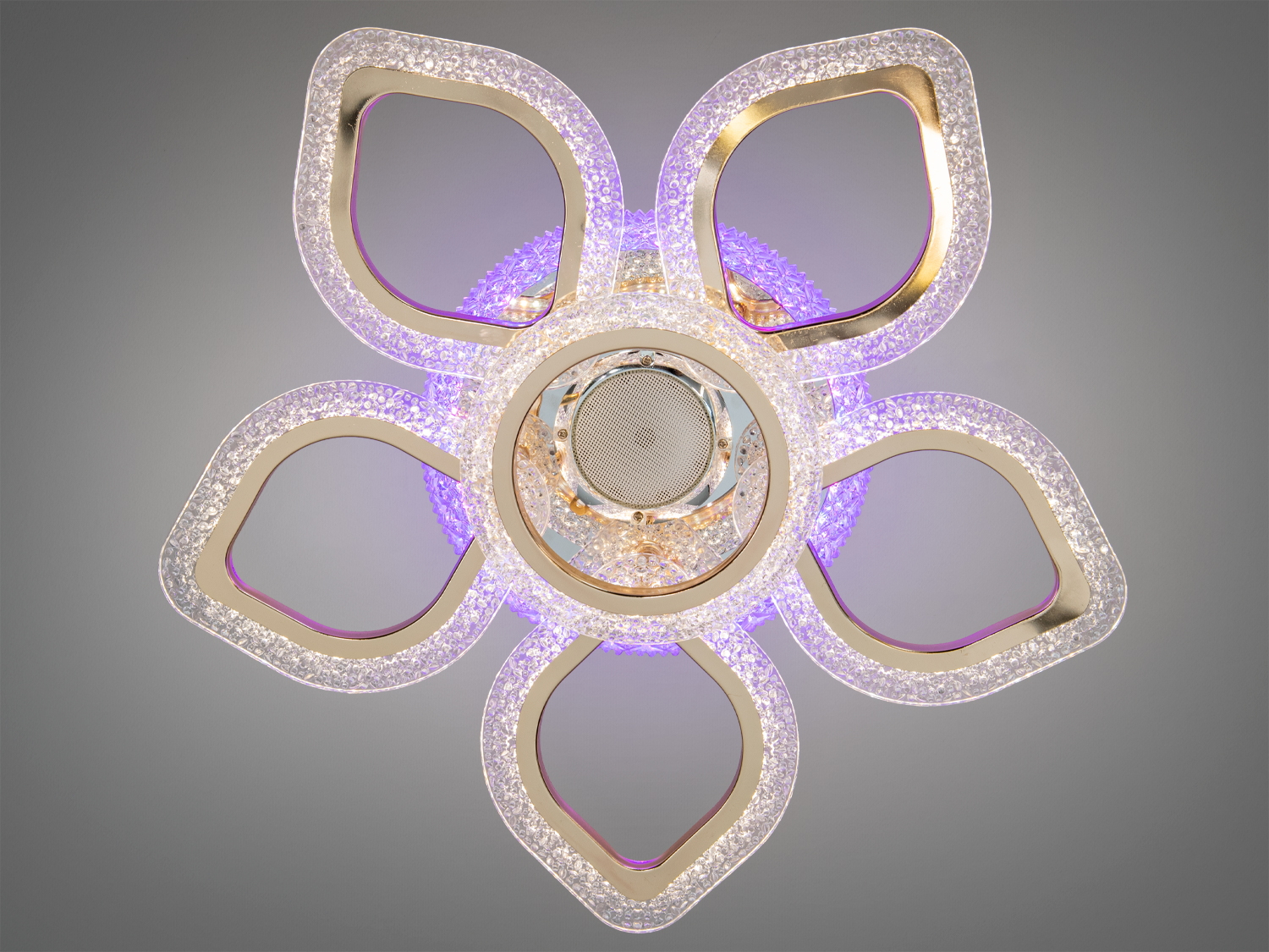 Декоративний світильник у формі квітки з п′ятьма пелюстками, виконаний з прозорого матеріалу для естетичного вигляду.