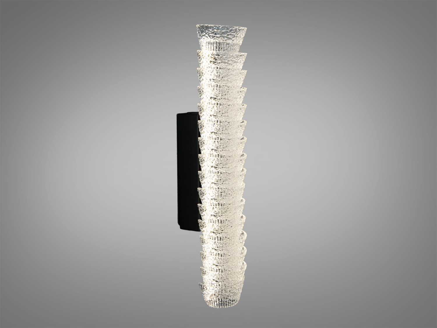 Настінний світильник з текстурованого акрилу, циліндрична форма, підходить для сучасного інтер′єру. Монтується вертикально.