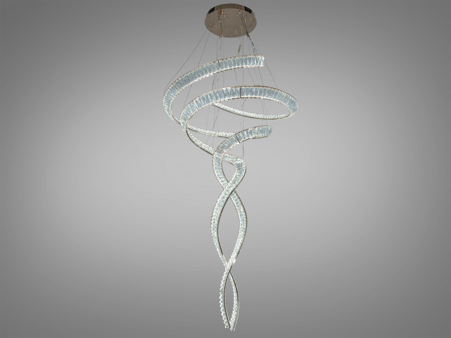 Спіральна люстра з прозорого матеріалу, підвісний монтаж, ідеальна для просторих кімнат.