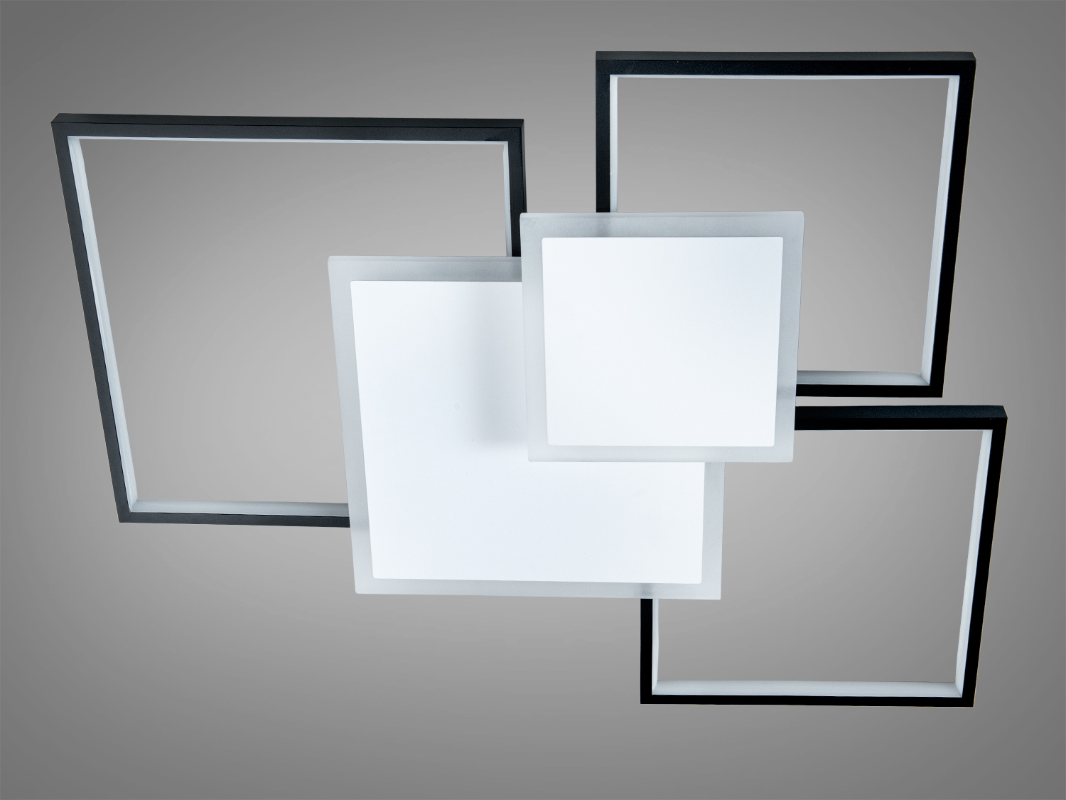 Світильник із чотирма квадратними рамками, що створюють асиметричний дизайн. Підходить для стелі, забезпечує м′яке освітлення.